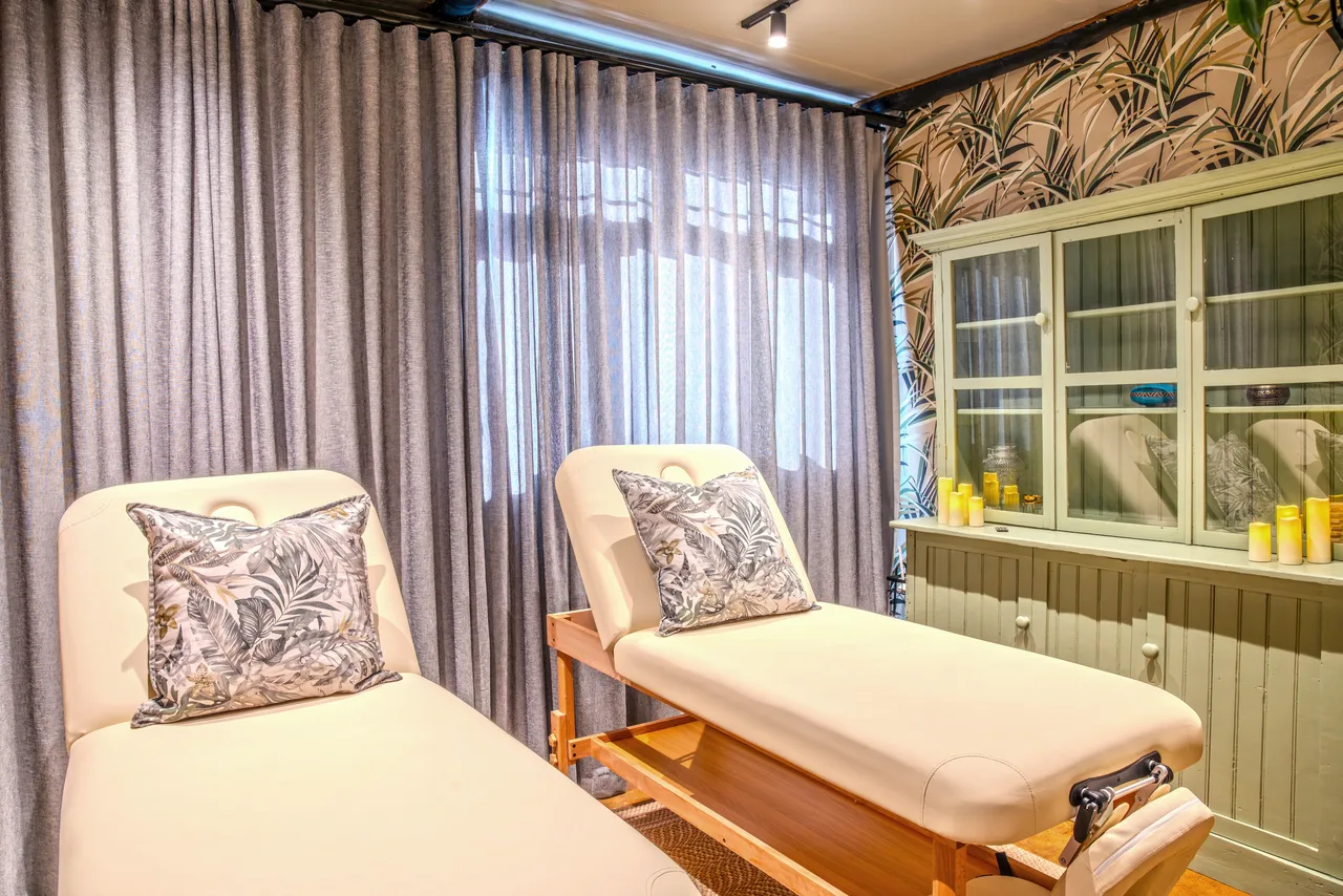 Garden suite — Two chaise loungers in the suite relaxation room