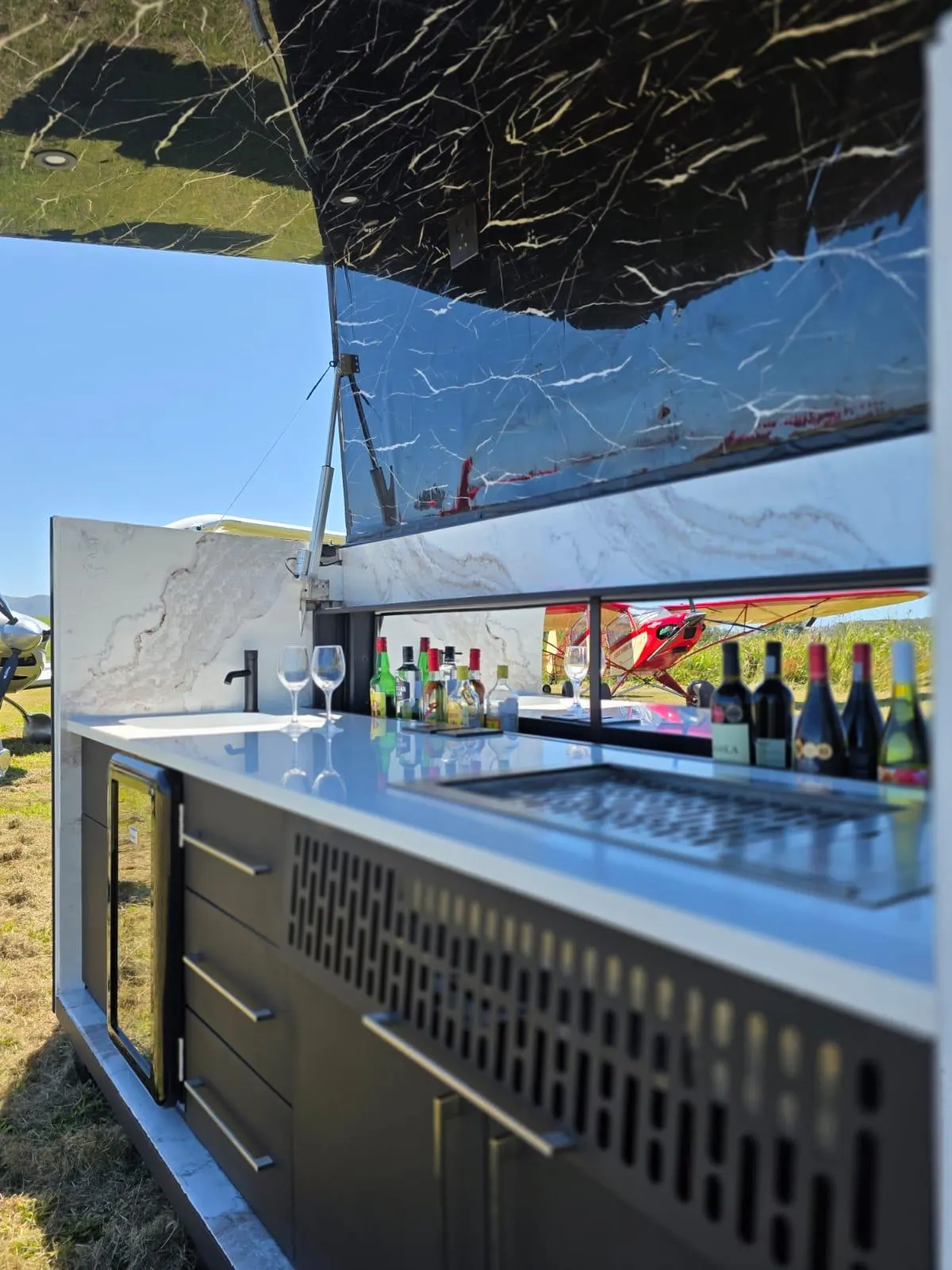 Stainless steel counter and drop-in grill on the Rover