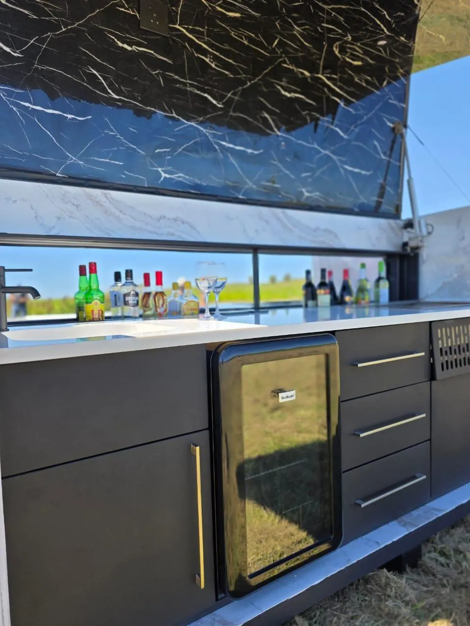Bar counter and sink under the Rover's raised canopy