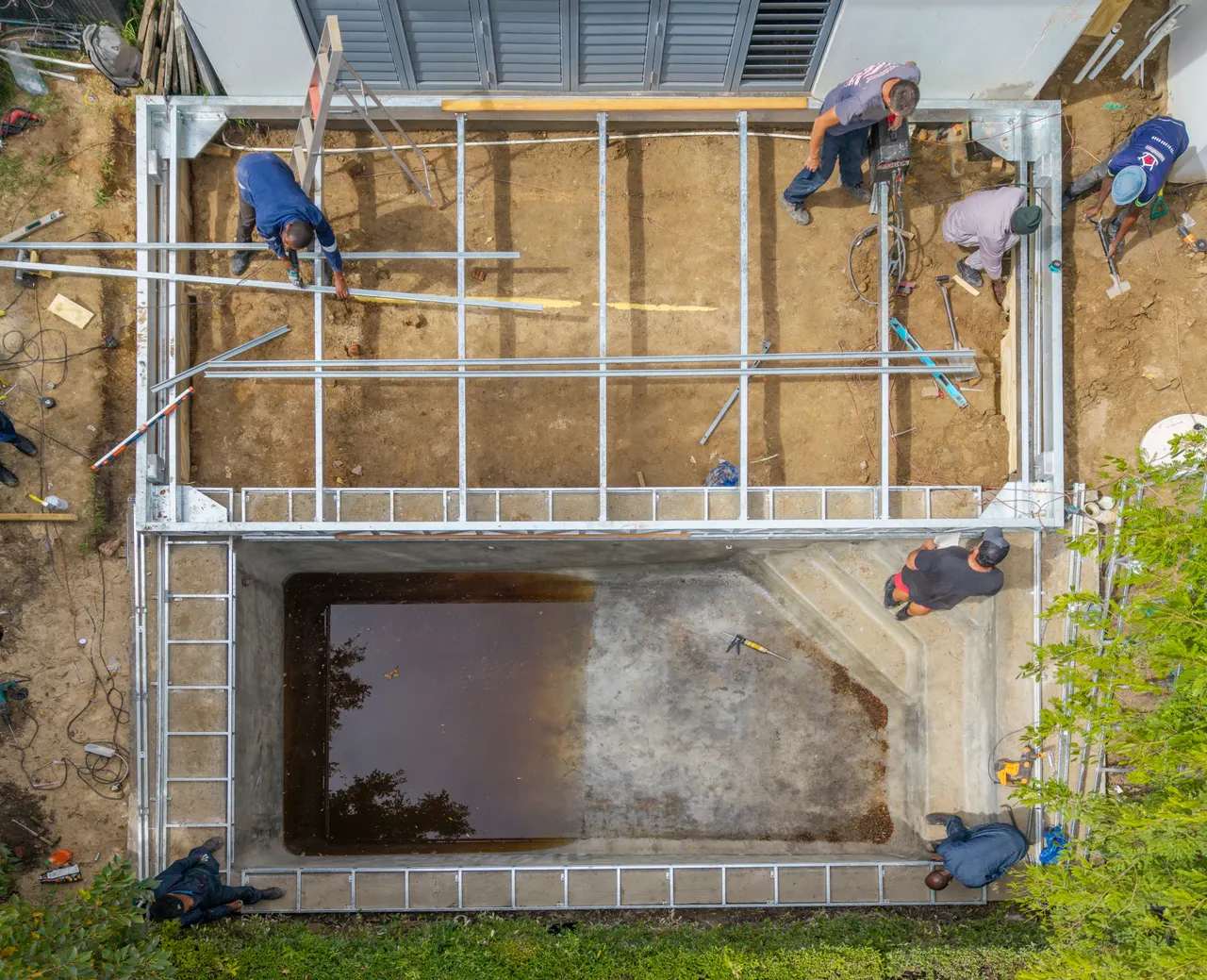 Drone view of the steel substructure being installed over the pool